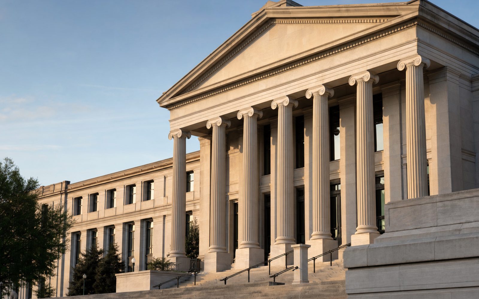 Neoclassical regulatory building facade in warm morning light — FDA approval timing